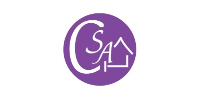 The logo consists of a purple circle with the white letters "CSA" inside it. The letters "C" and "S" are styled in a standard font, while the "A" is stylized to resemble the outline of a house, with the crossbar of the "A" extending to form a horizontal line.
